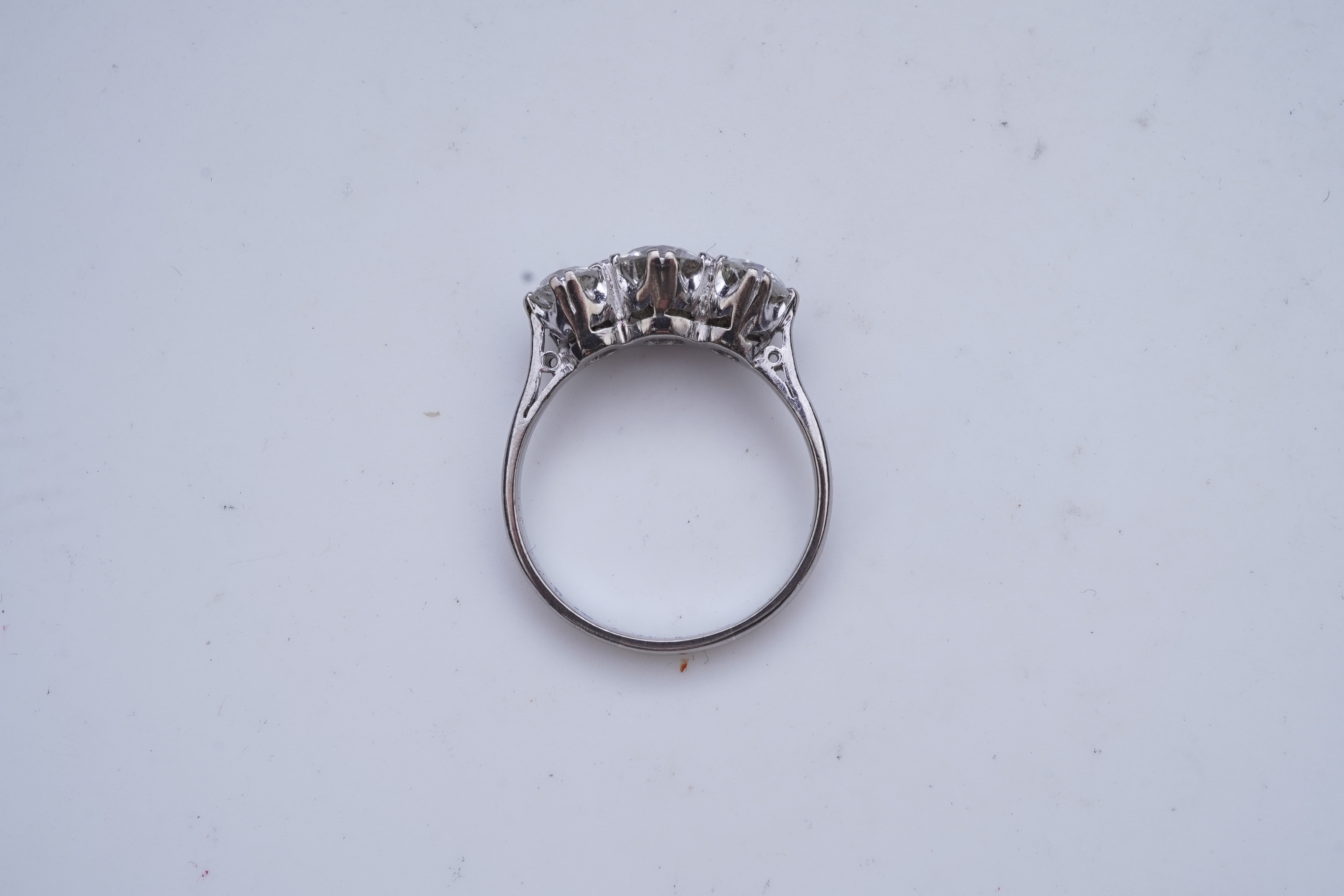 A three-stone diamond ring, early 20th century